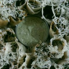 Cheese Paneer spinach dosa roll A picture of Cheese Paneer spinach dosa roll.