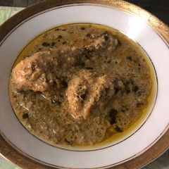 A picture of Dahi wala Kukkad Chicken in yoghurt curry base.