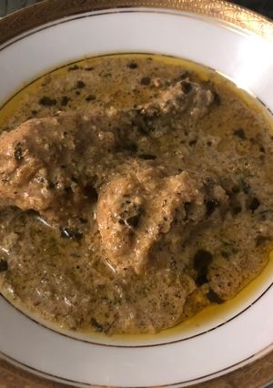 A picture of Dahi wala Kukkad Chicken in yoghurt curry base.