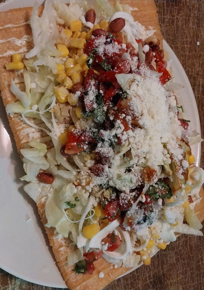 Una foto de 🍅Cacala con pico de gallo🧅