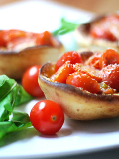A picture of Parmesan Bread Bowls with Roasted Cherry Tomatoes.