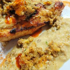 A picture of Chicken Boudin w Crabmeat Sauce.