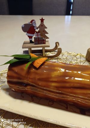 Une photo de Buche mousse de tonka et insert de clémentines #novembre2024