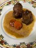 Rabo estofado al Pedro Ximénez y reducción de vino tinto