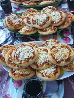 صورة لوصفة فطاير بيتزا 🍕 😋