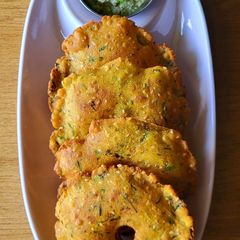 A picture of Maize and sponge gourd thalipeeth.