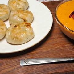 A picture of Steam & fry momo.