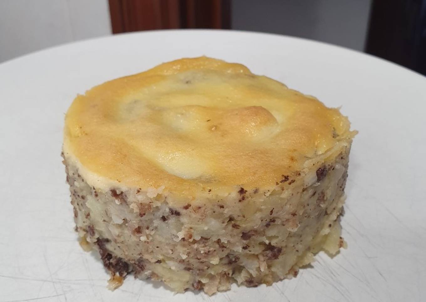 Patatas enmascaradas con butifarra gratinadas al allioli
