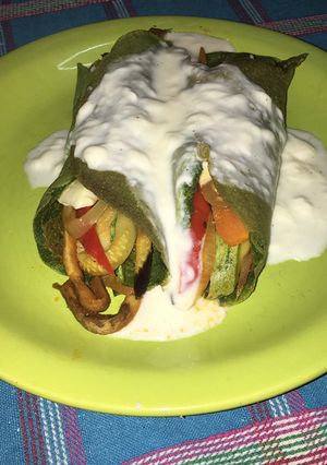 Una foto de Crepps de espinaca rellenos de vegetales 🌯