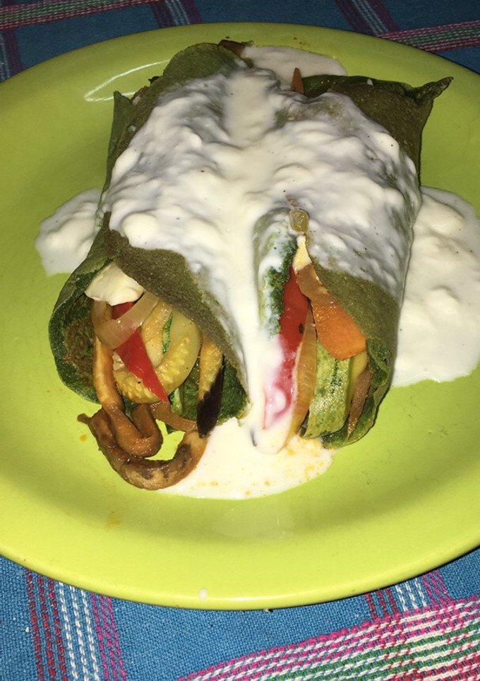 Una foto de Crepps de espinaca rellenos de vegetales 🌯