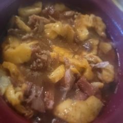 A picture of Crockpot Orange Glazed Country Ham w/ Sweet Peppered Pineapple.