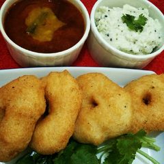 A picture of Tricolour Sambhar Vada.