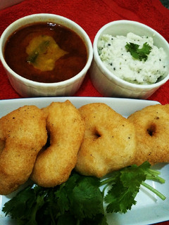 A picture of Tricolour Sambhar Vada.