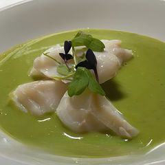 A picture of Anise steamed cod with lemongrass and pea purée.