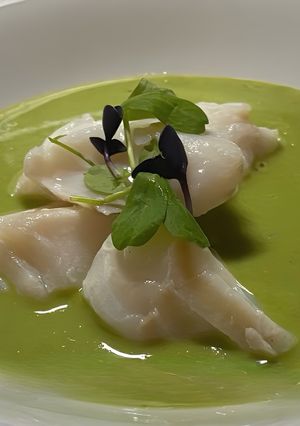 A picture of Anise steamed cod with lemongrass and pea purée.