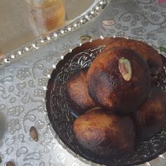 A picture of Aloo ke falahari non fried gulab jamun.