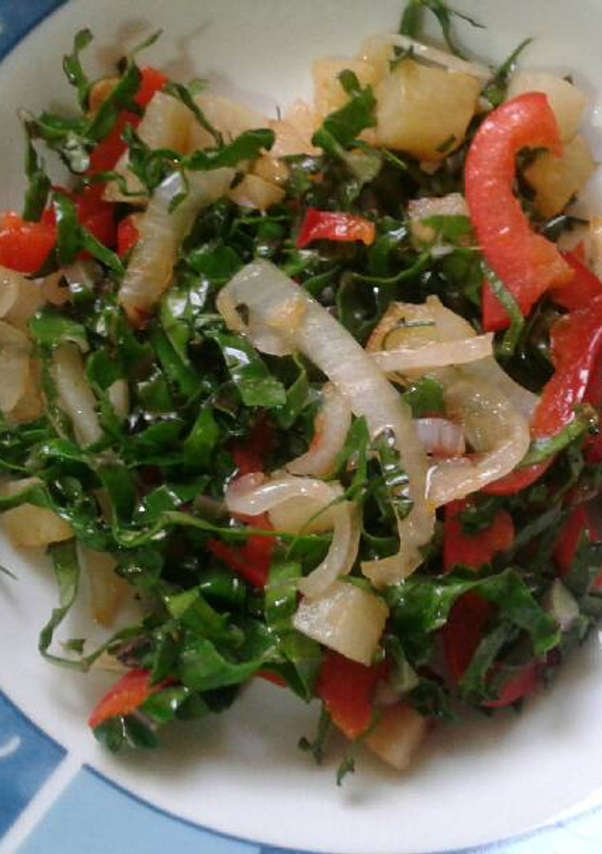 Una foto de Salteado de kale y pimientos