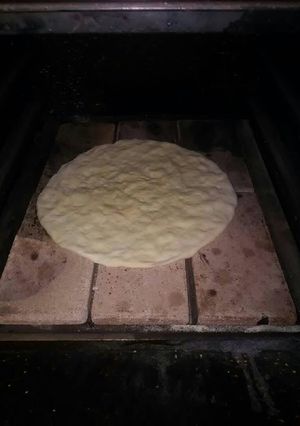 Una foto de Pizza a la piedra