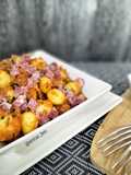 Patatas ahumadas con jamón en salsa de tomate picantona