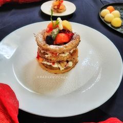 Buttermilk French Toast stuffed with fresh fruit salad A picture of Buttermilk French Toast stuffed with fresh fruit salad.