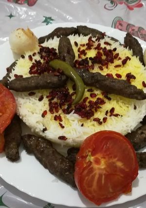 A picture of Kebab with Saffron Rice and Barberries.