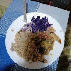 A picture of #themchallengPilau, purple cabbage and kienyenji chicken.