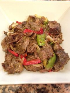 Una foto de Carne de coja con fritada de pimientos y cebolla