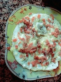 صورة لوصفة بيض عيون باللنشن والجبنه الرومي
