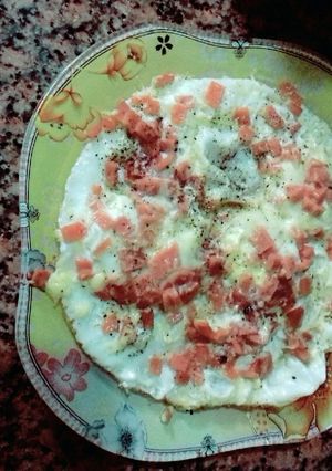 صورة لوصفة بيض عيون باللنشن والجبنه الرومي