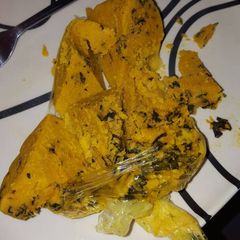 A picture of Okpa with vegetable.