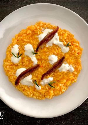 Foto di Risotto peperoni, crema di bufala e alici