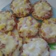 Mini pizzas de piña, jamón y queso