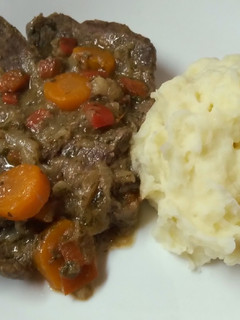 Una foto de Bifes a la criolla
