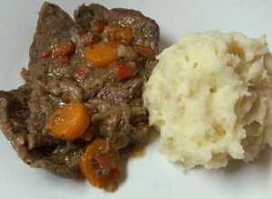 Una foto de Bifes a la criolla