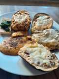 Berenjenas gratinadas con queso mozzarella