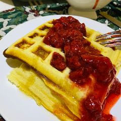 A picture of Halloween Waffles and Strawberry Sauce.