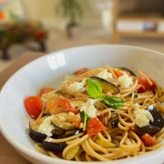 A picture of Aglio e olio inspired pasta with aubergine, tomato and mozzarella (⭐️ best ever summer pasta 🍝).