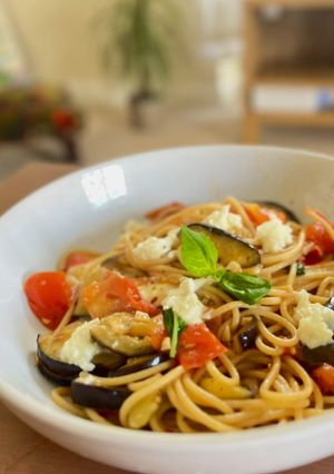 A picture of Aglio e olio inspired pasta with aubergine, tomato and mozzarella (⭐️ best ever summer pasta 🍝).
