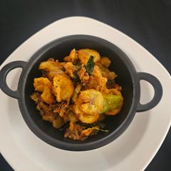 A picture of Kacha kela masala fry (Jain).