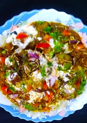 A picture of Chhole With Stuff Tikki Chaat.