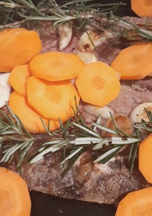 Una foto de Bife americano con Cola-Cola y romero