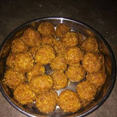 A picture of Bengali style coconut laddu.