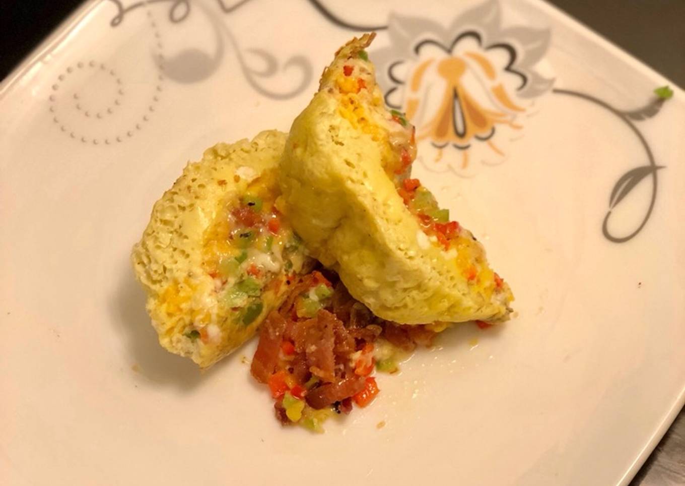 Easy egg casserole with hot cheese, pepper and bacon