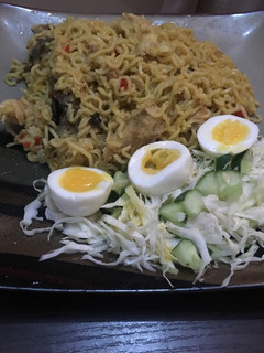 A picture of Palm oil noodles with dried Mangala fish.