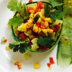 A picture of Corn cucumber tomato salad.