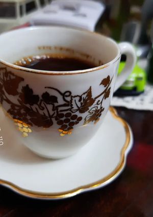 Une photo de Café à la main ☕
