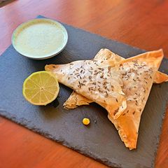 A picture of Sweet Corn and Feta Samosas.