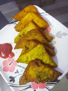 ब्रेड पालक पकोडा (bread palak pakoda recipe in marathi) रेसिपी चे मुख्य फोटो