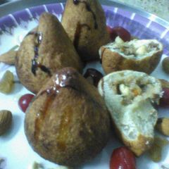 A picture of Fried  flour semolina modak.