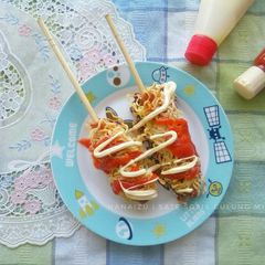 A picture of Sausage Rolled Noodles Satay (Indonesian Street Food).